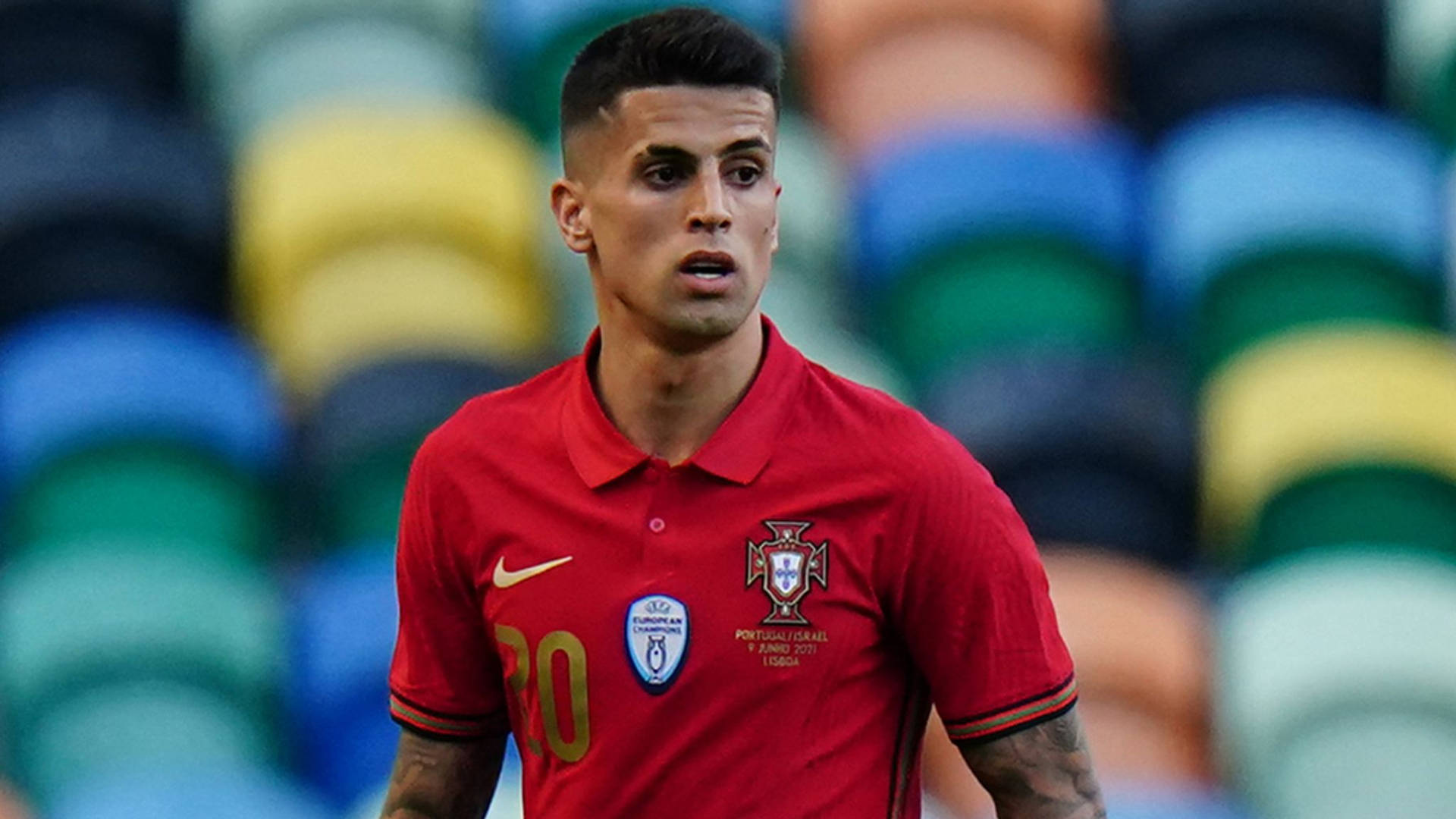 Joao Cancelo Looks At Something Background