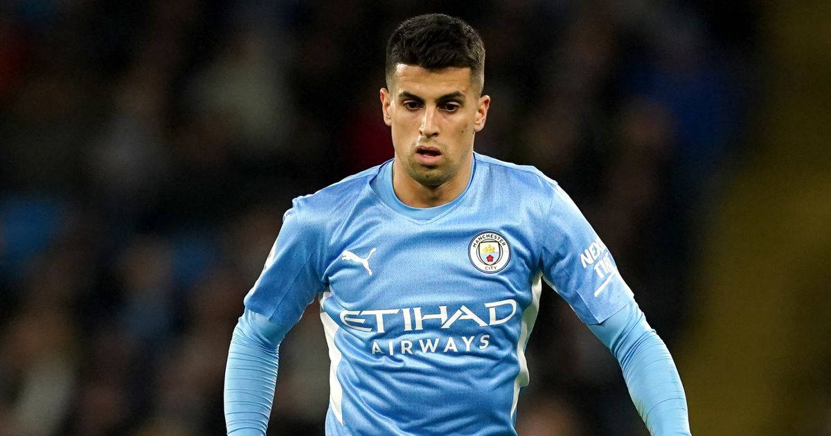 Joao Cancelo Medium Shot In Action Background