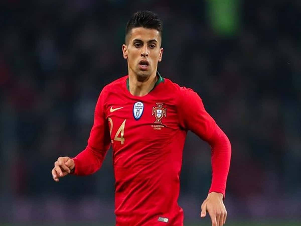 Joao Cancelo Red Uniform Background