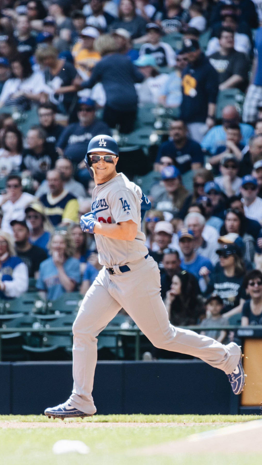 Joc Pederson Smiling While Jogging Background