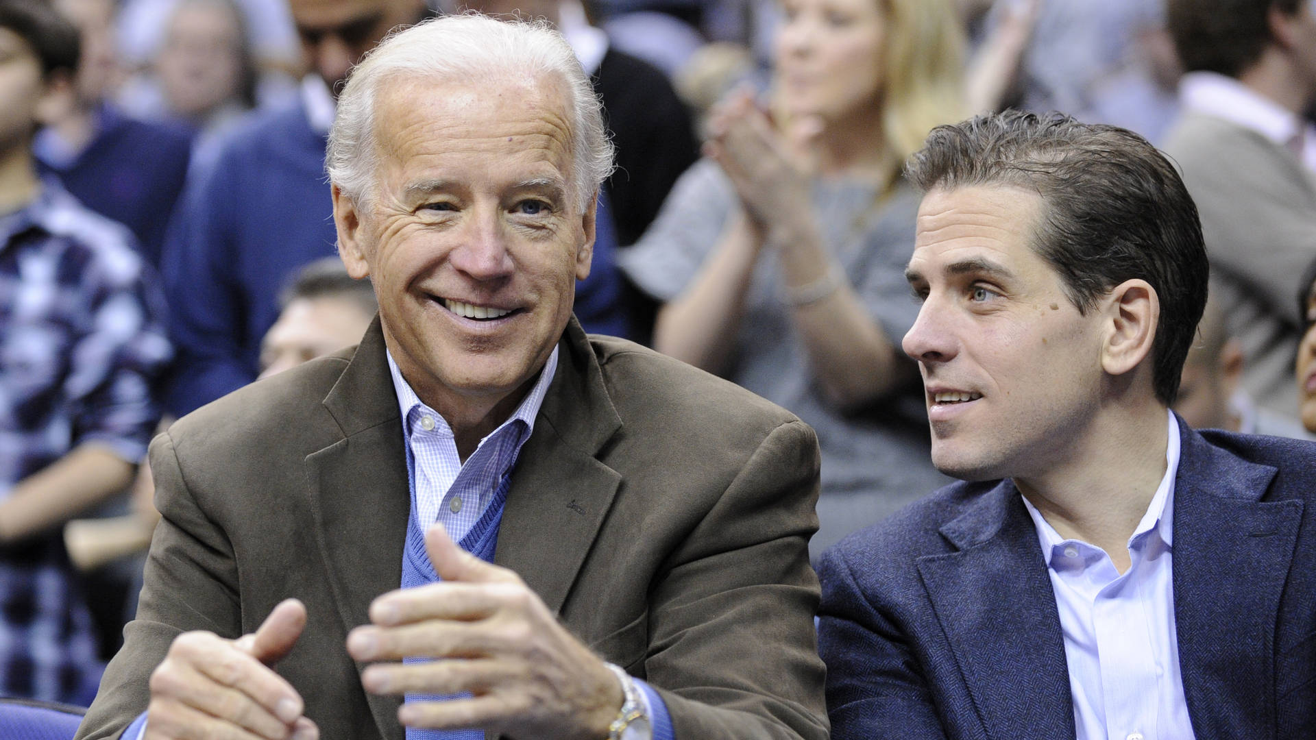 Joe And Hunter Biden Watching Game Background