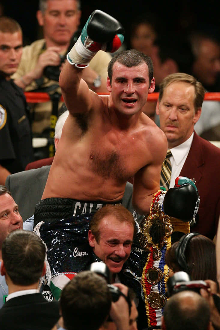 Joe Calzaghe Carried By His Coach Background