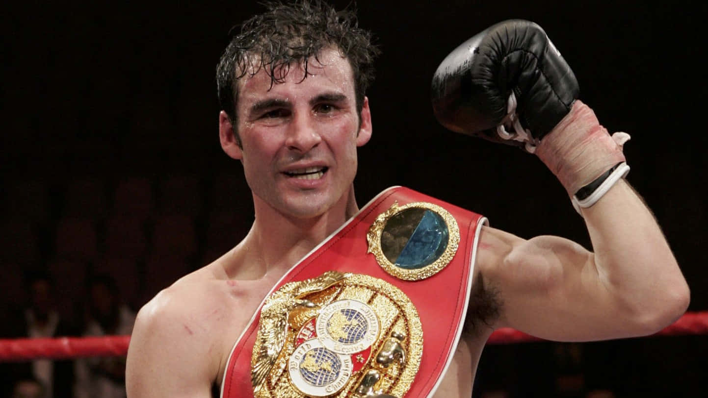 Joe Calzaghe Wins A Wbc World Title Belt Background
