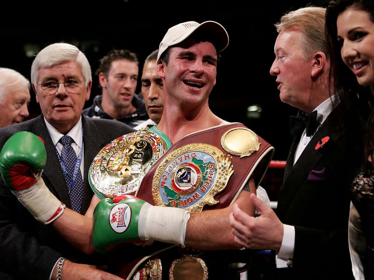 Joe Calzaghe Wins Two World Title Belts Background