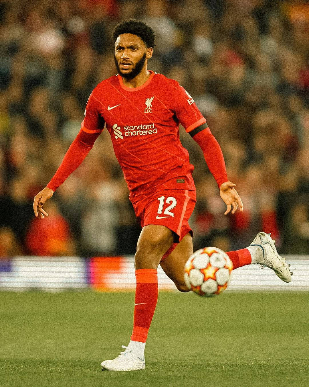 Joe Gomez Running Behind Ball Background