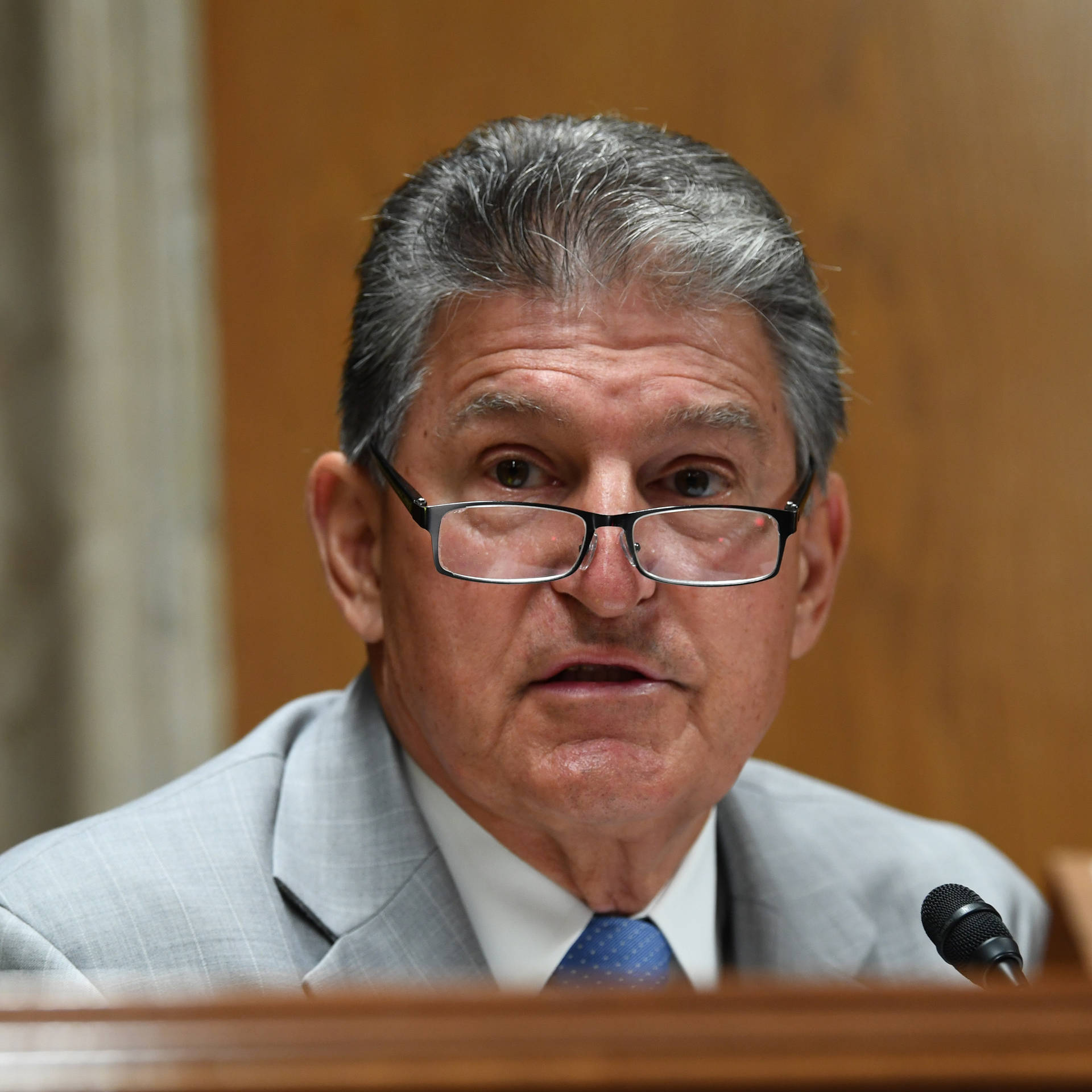 Joe Manchin And His Square Glasses Background