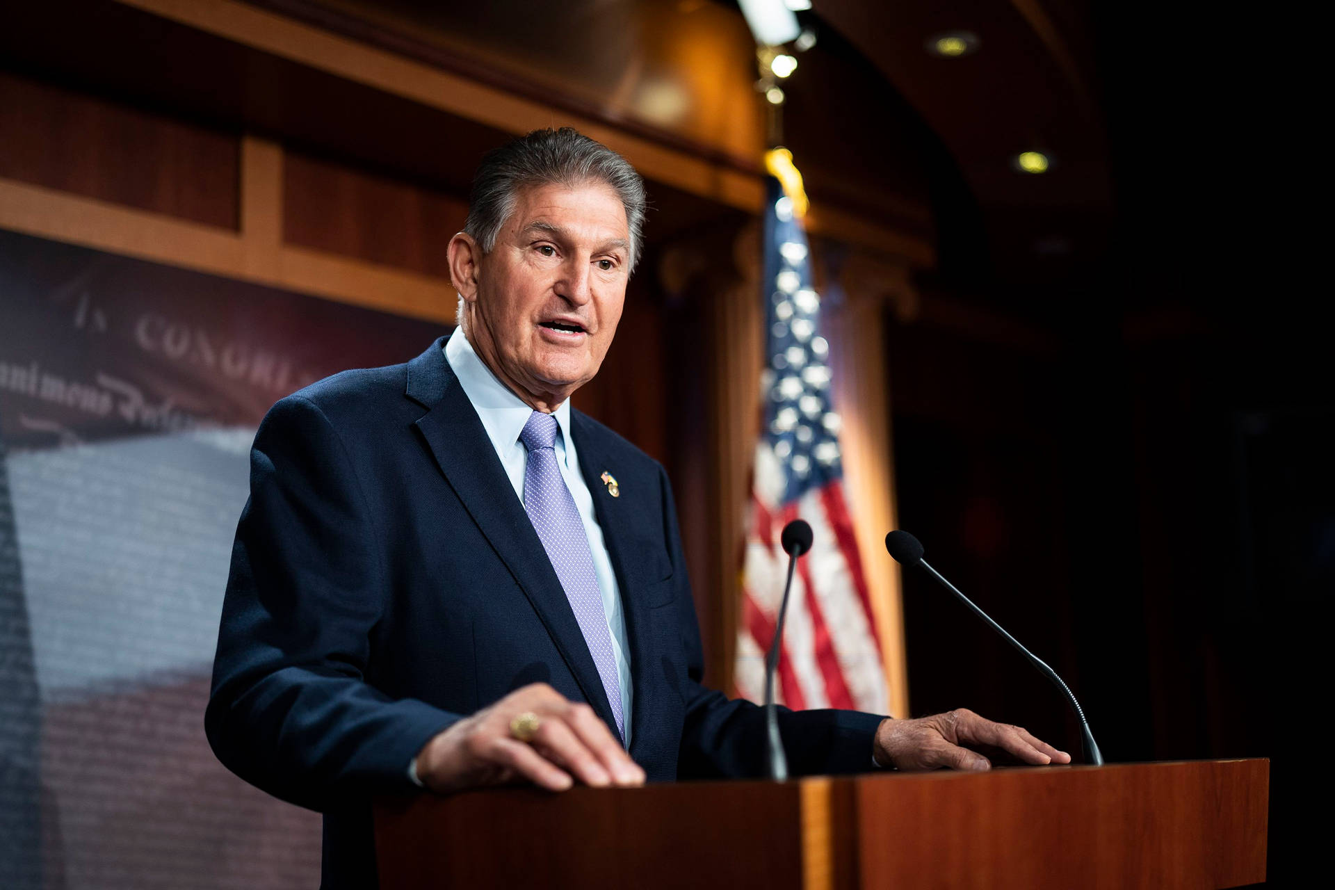 Joe Manchin Giving A Speech Background