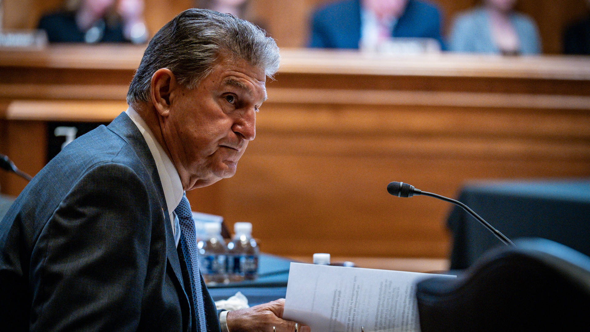 Joe Manchin Looking Concerned Background