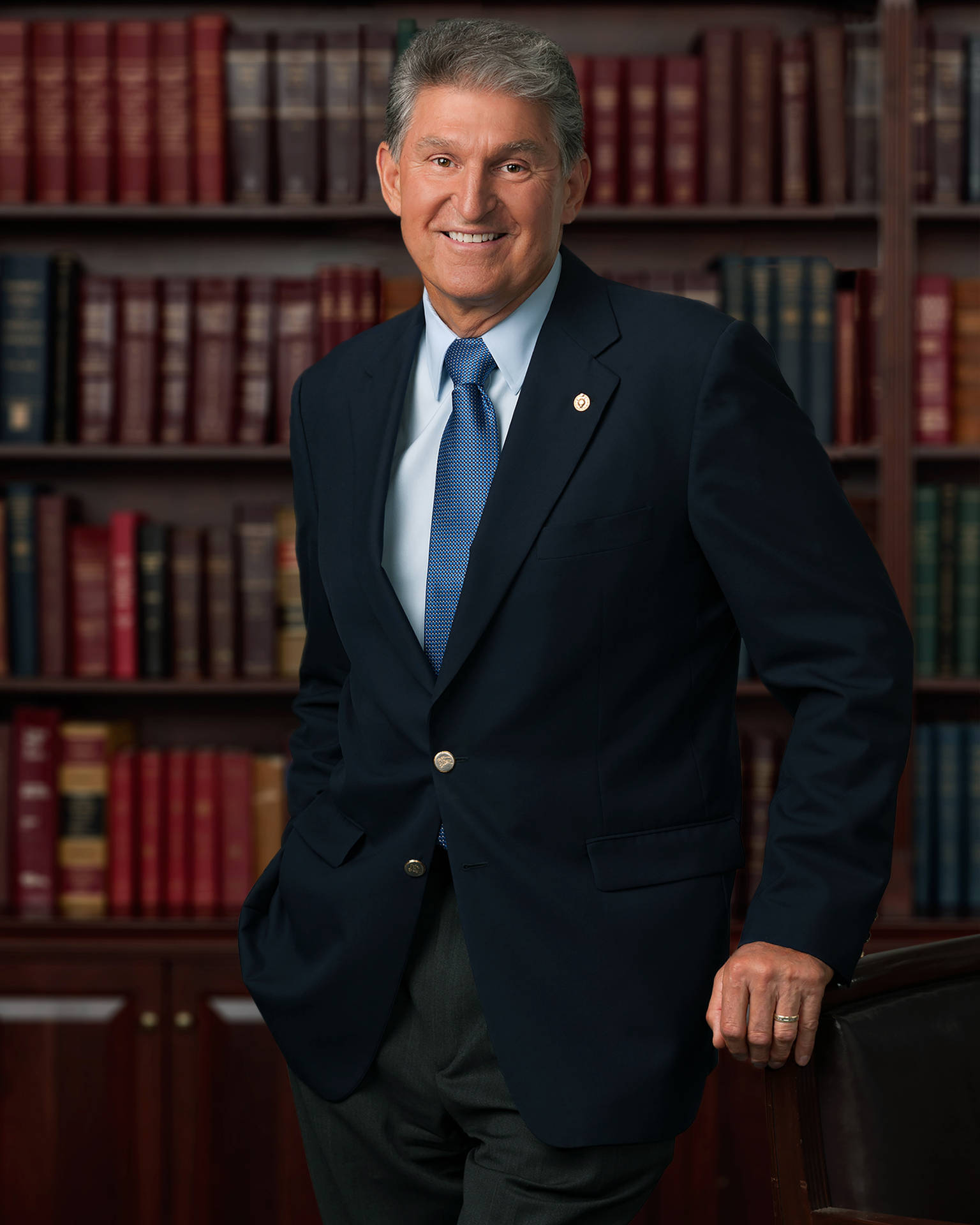 Joe Manchin On A Library Background