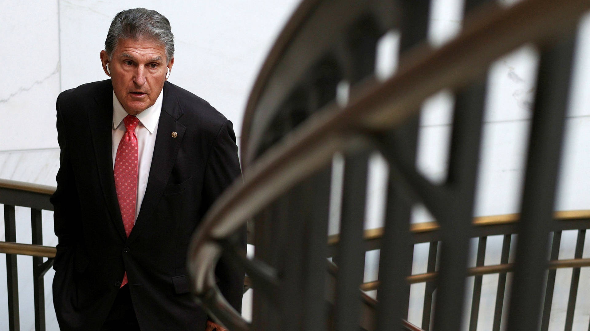 Joe Manchin On The Stairs Background