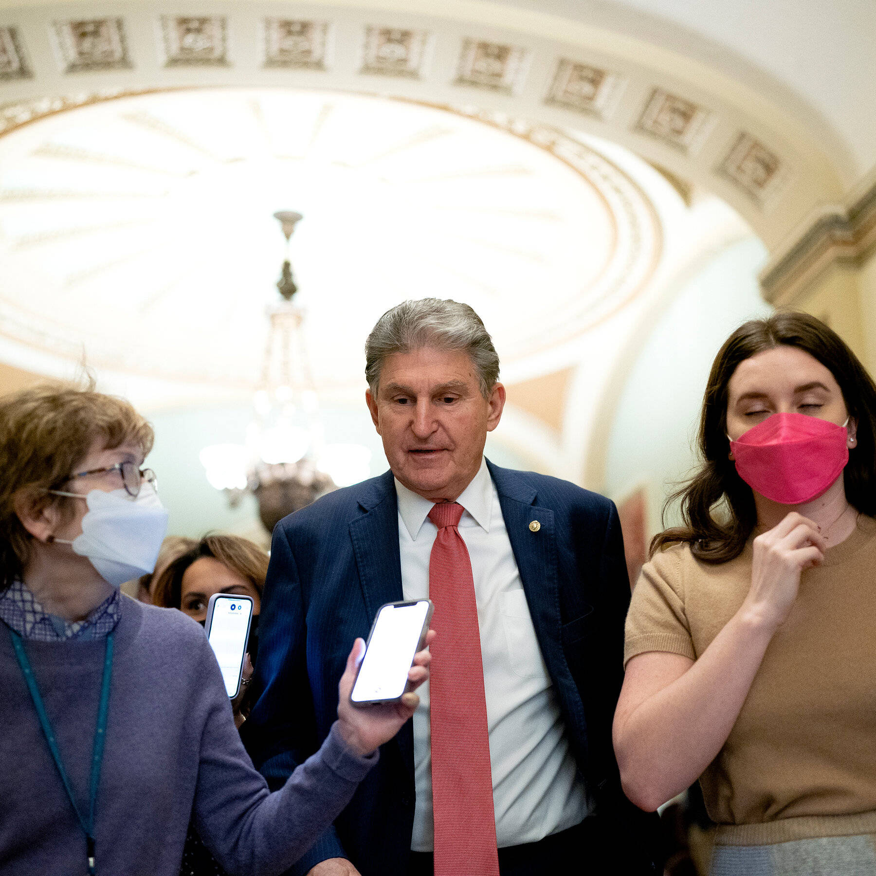 Joe Manchin Walking With The Reporters