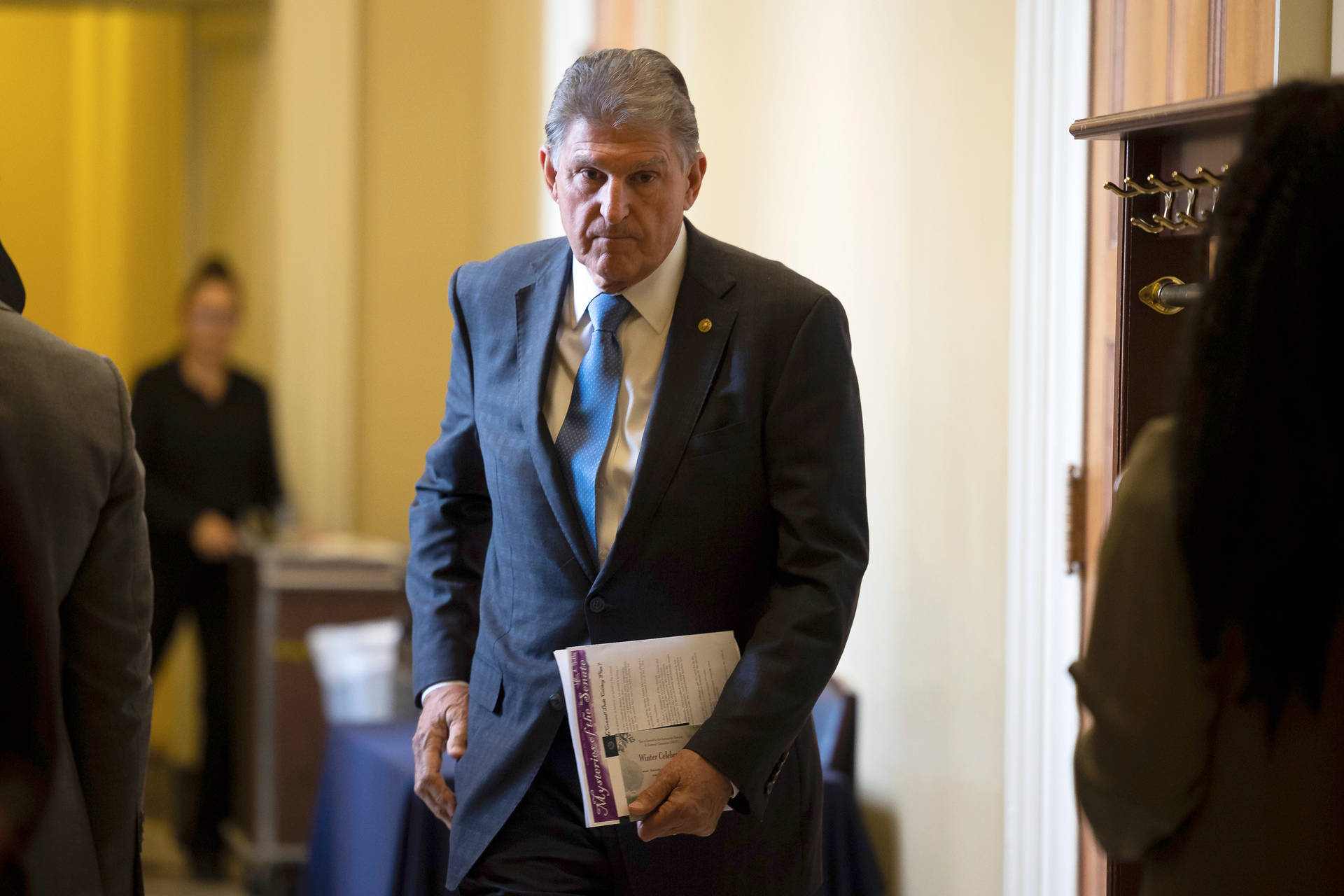 Joe Manchin With Documents Background