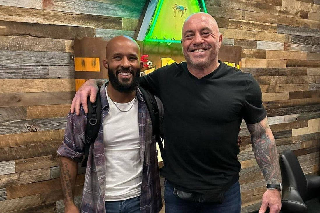 Joe Rogan With Demetrious Johnson Background