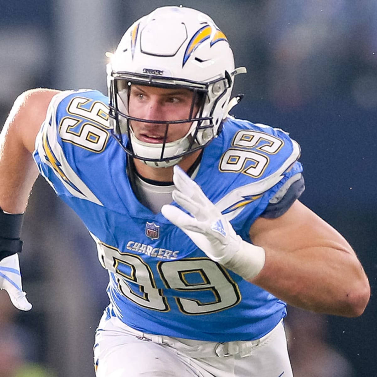 Joey Bosa Football Player Running Speed Background