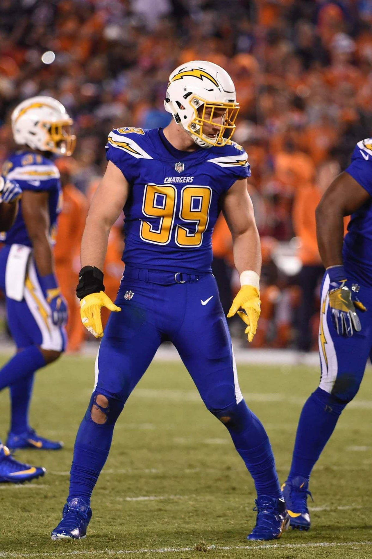 Joey Bosa In Mid-game Action Background