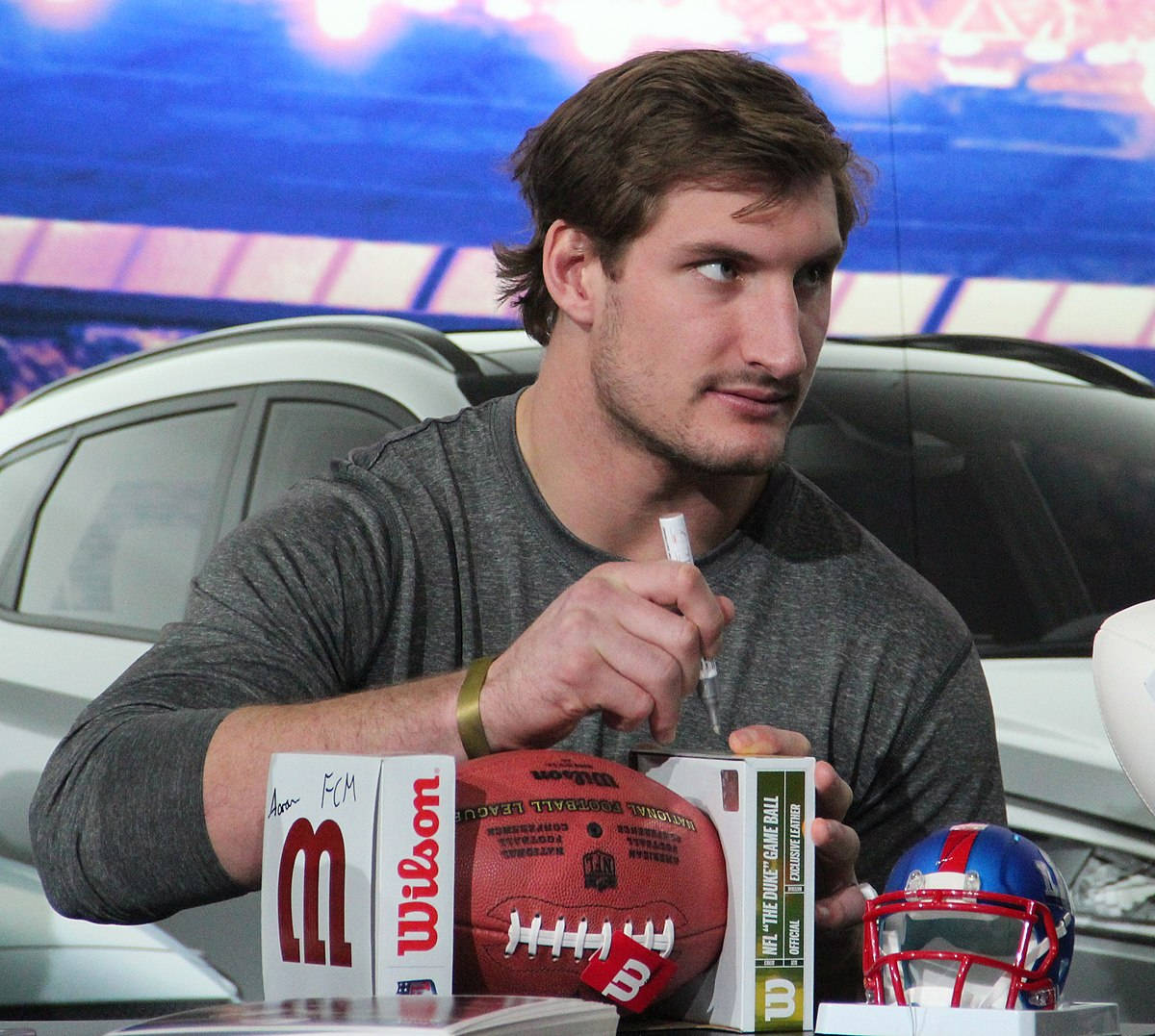 Joey Bosa Press Conference Fan Signing Background