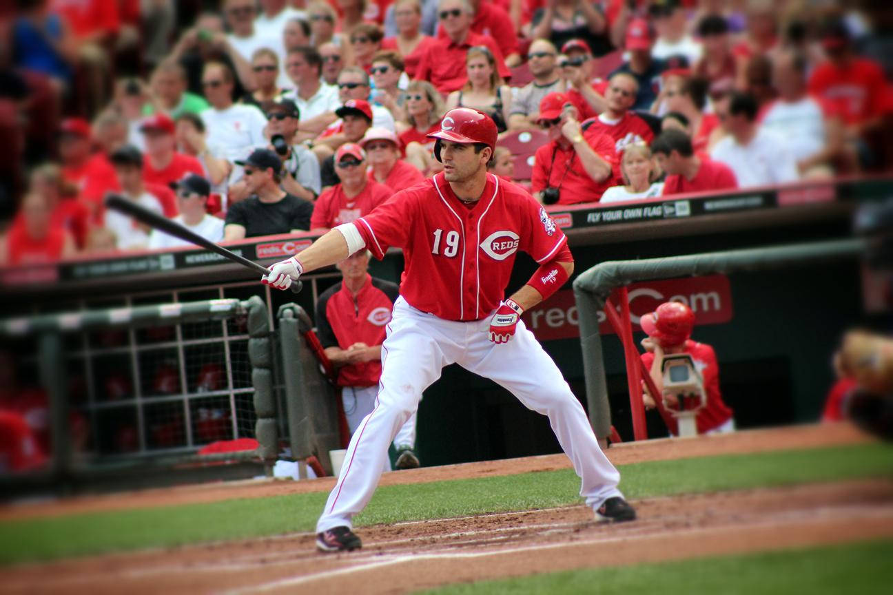 Joey Votto Holding Bat Crowd Watches Background