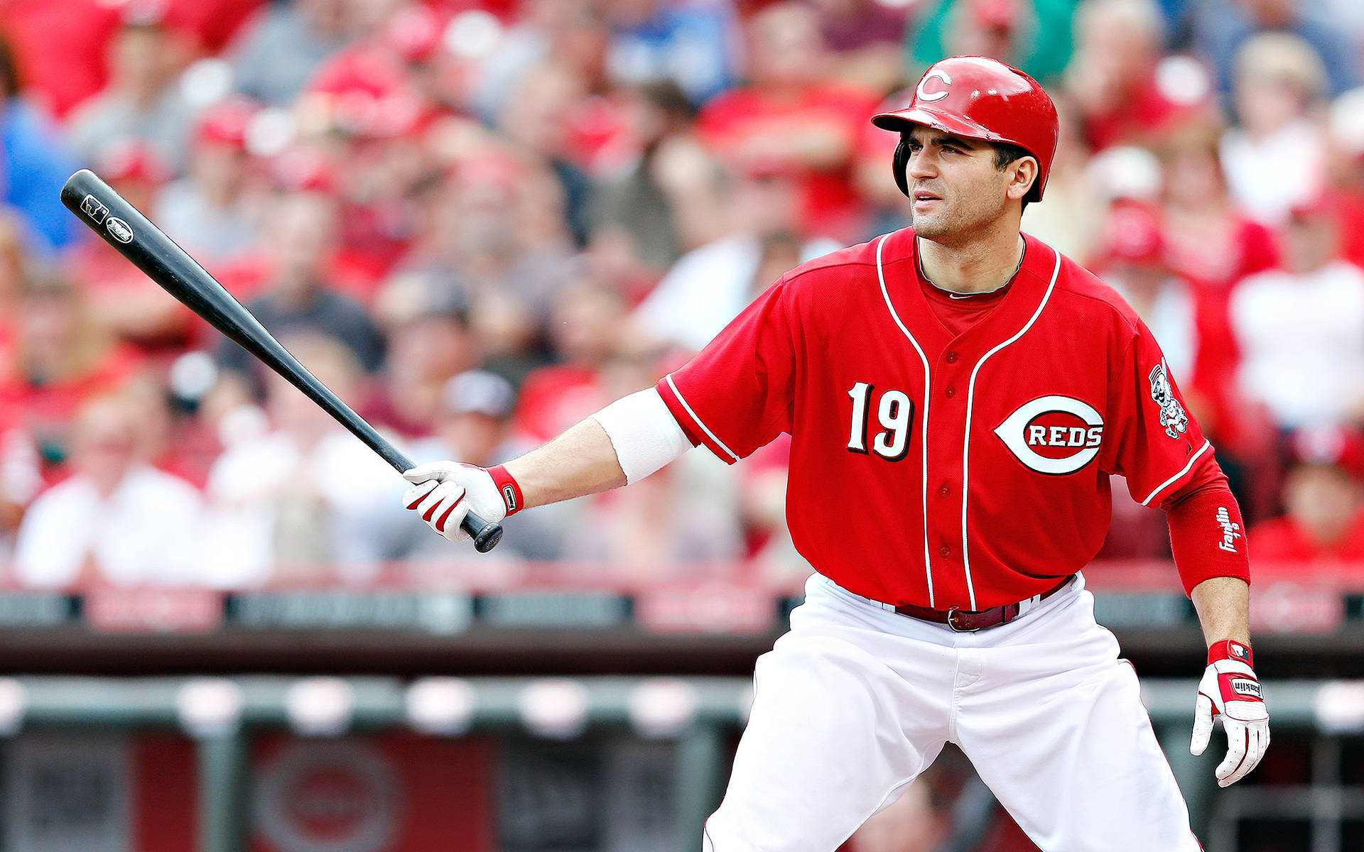 Joey Votto Holding Black Baseball Bat Background