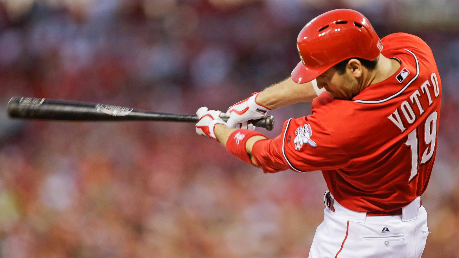 Joey Votto Mid-swing Red Uniform Background