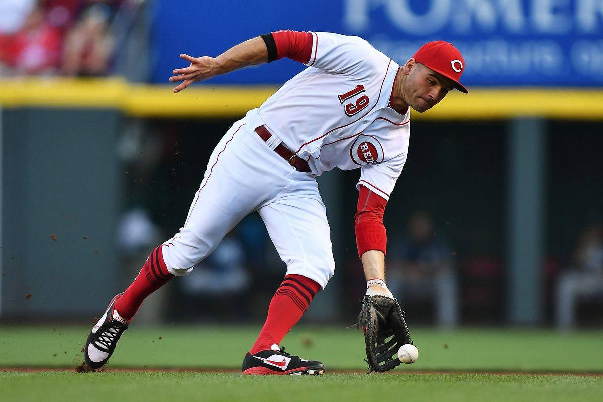 Joey Votto Scooping Up The Baseball Background