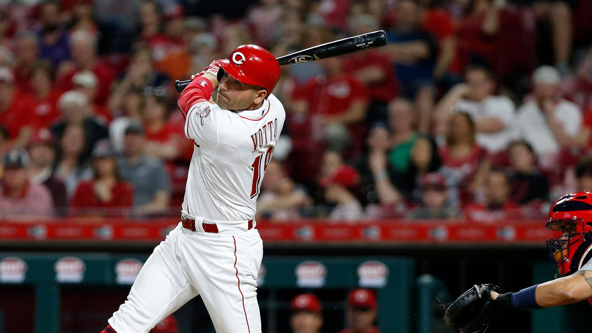 Joey Votto Swinging Bat Near Crowd Background