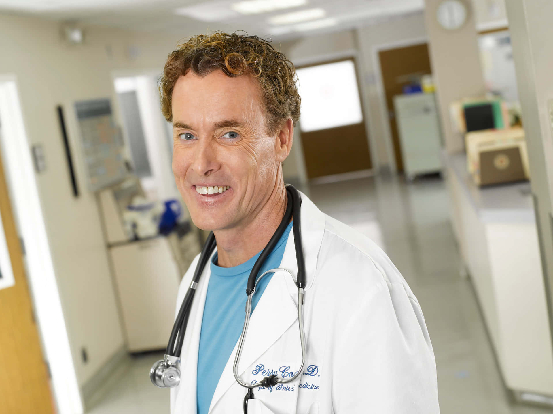 John C. Mcginley Smiling At An Event Background