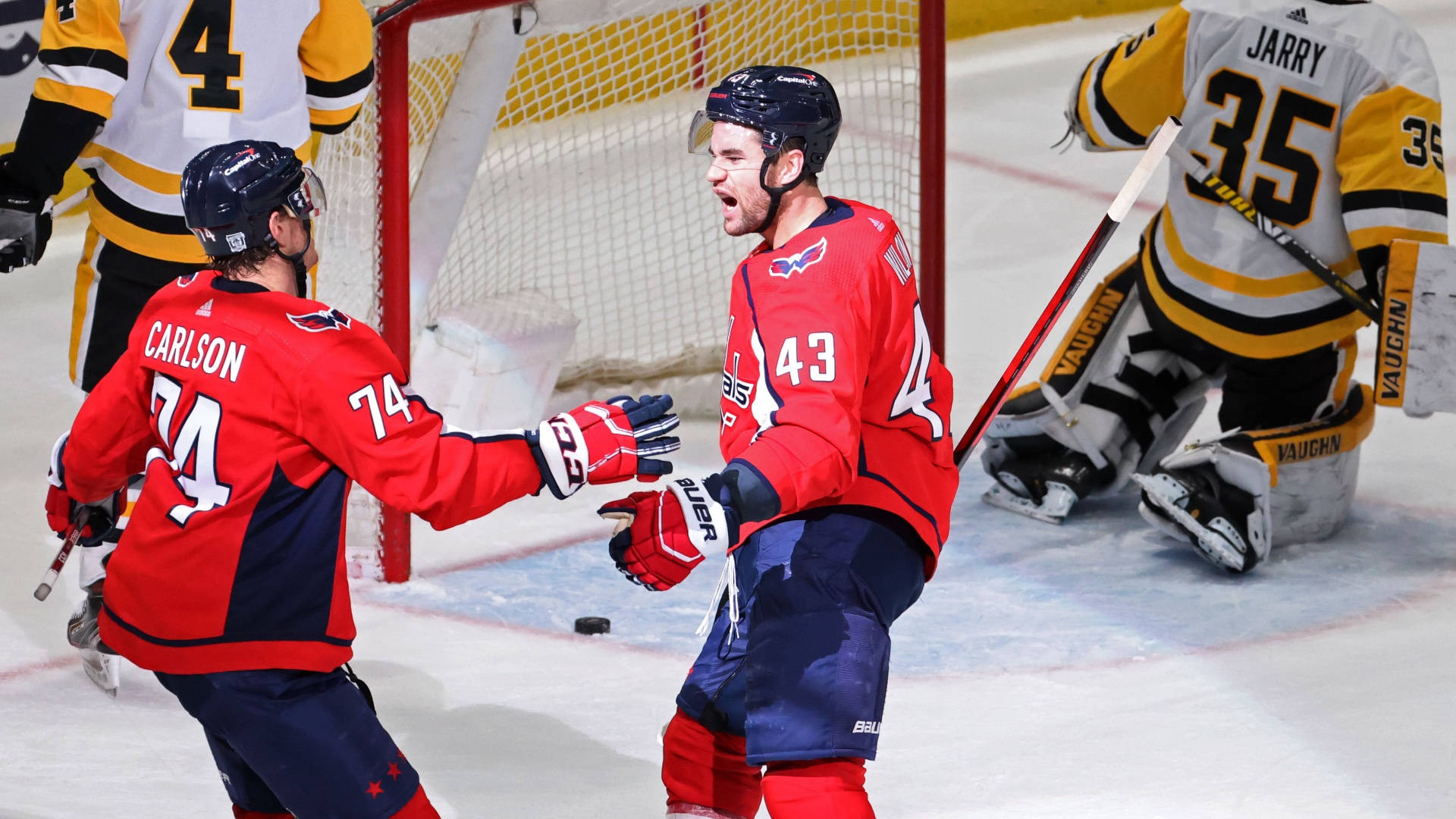 John Carlson Of The Washington Capitals In Action Against The Boston Bruins Background