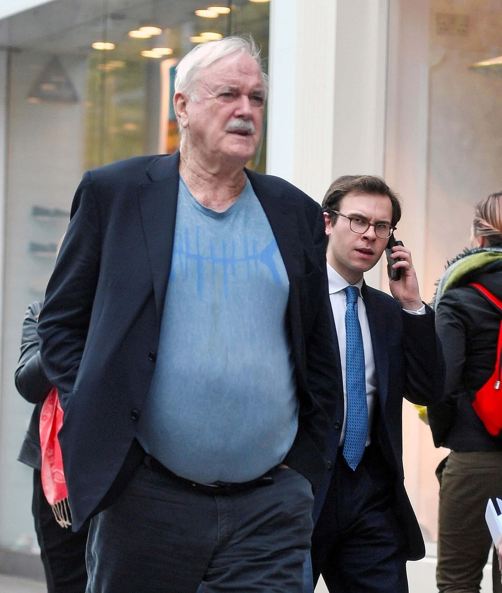 John Cleese Casual Walk Background