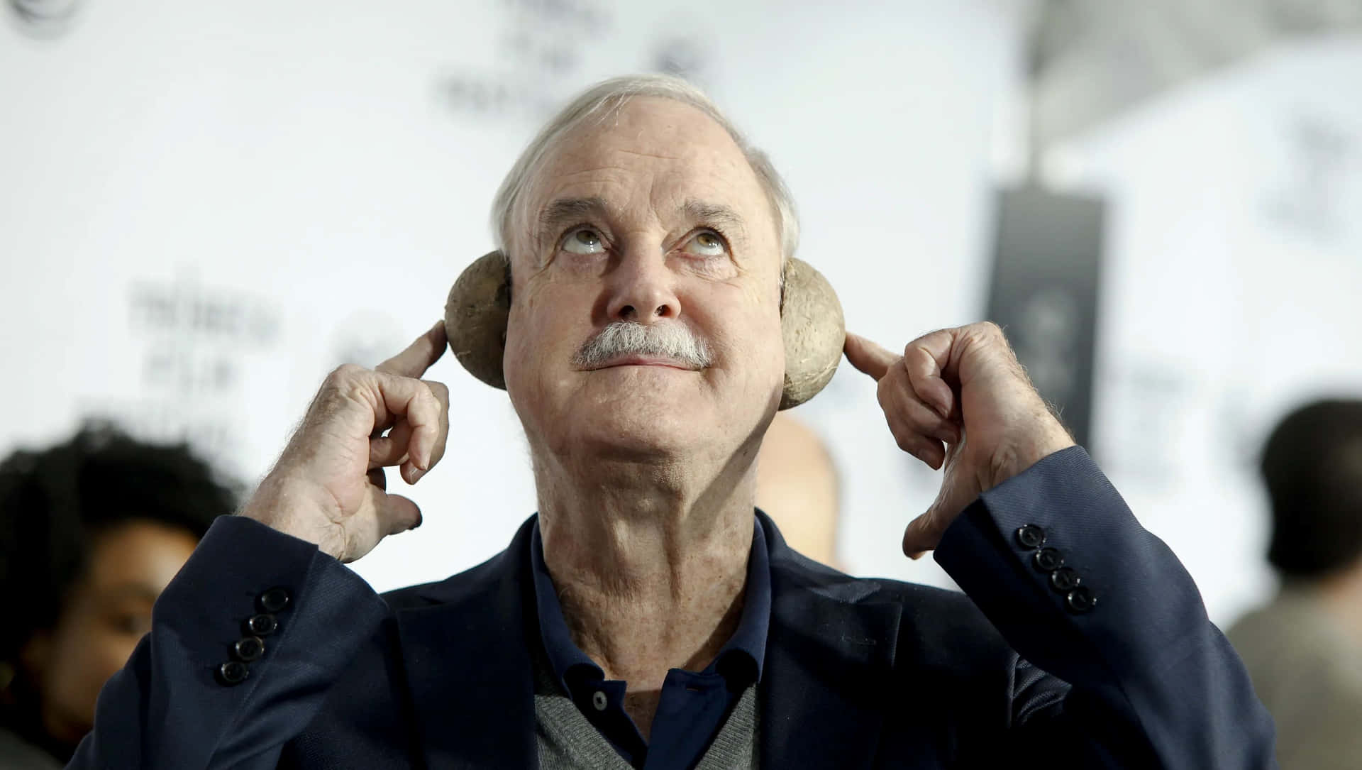 John Cleese Potato Phone Pose Background