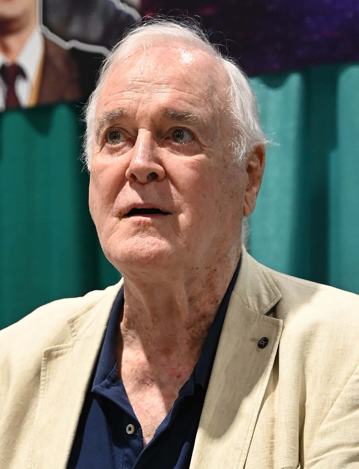 John Cleese Speaking Event Background