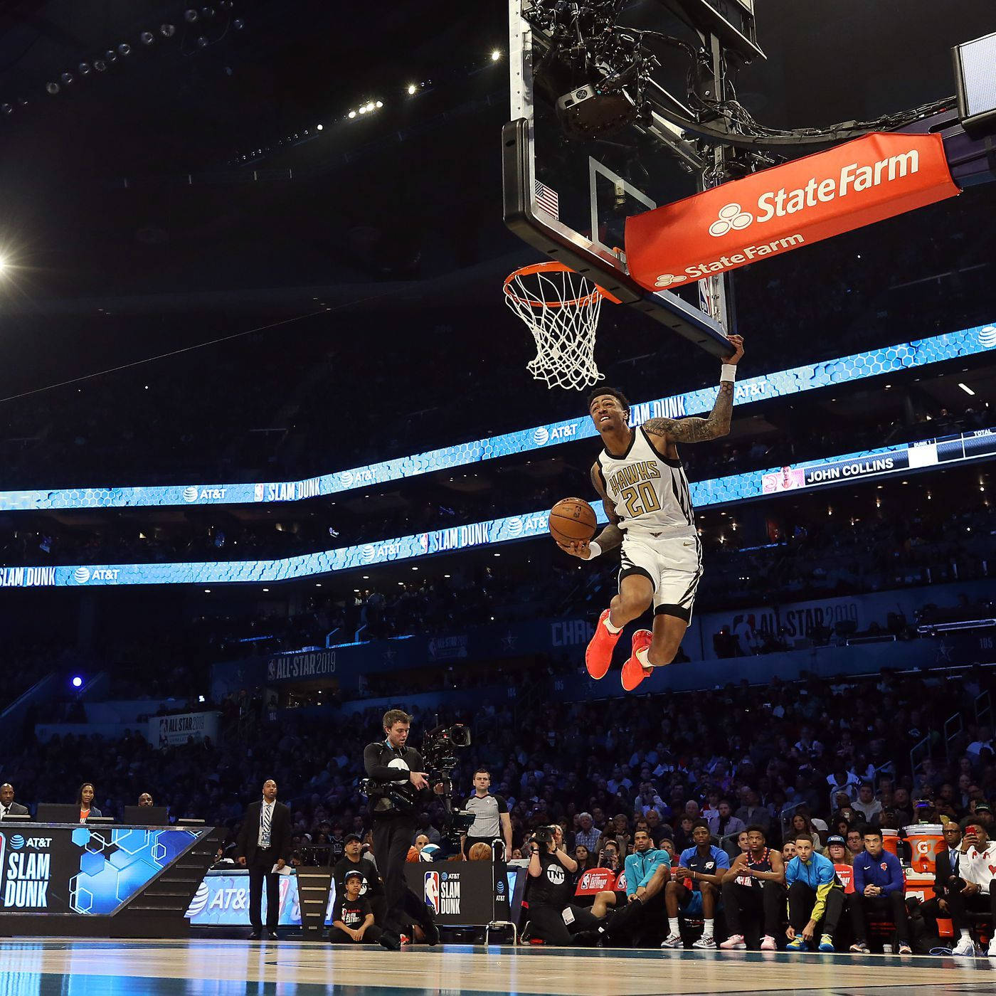 John Collins In His Remarkable Dunk Background