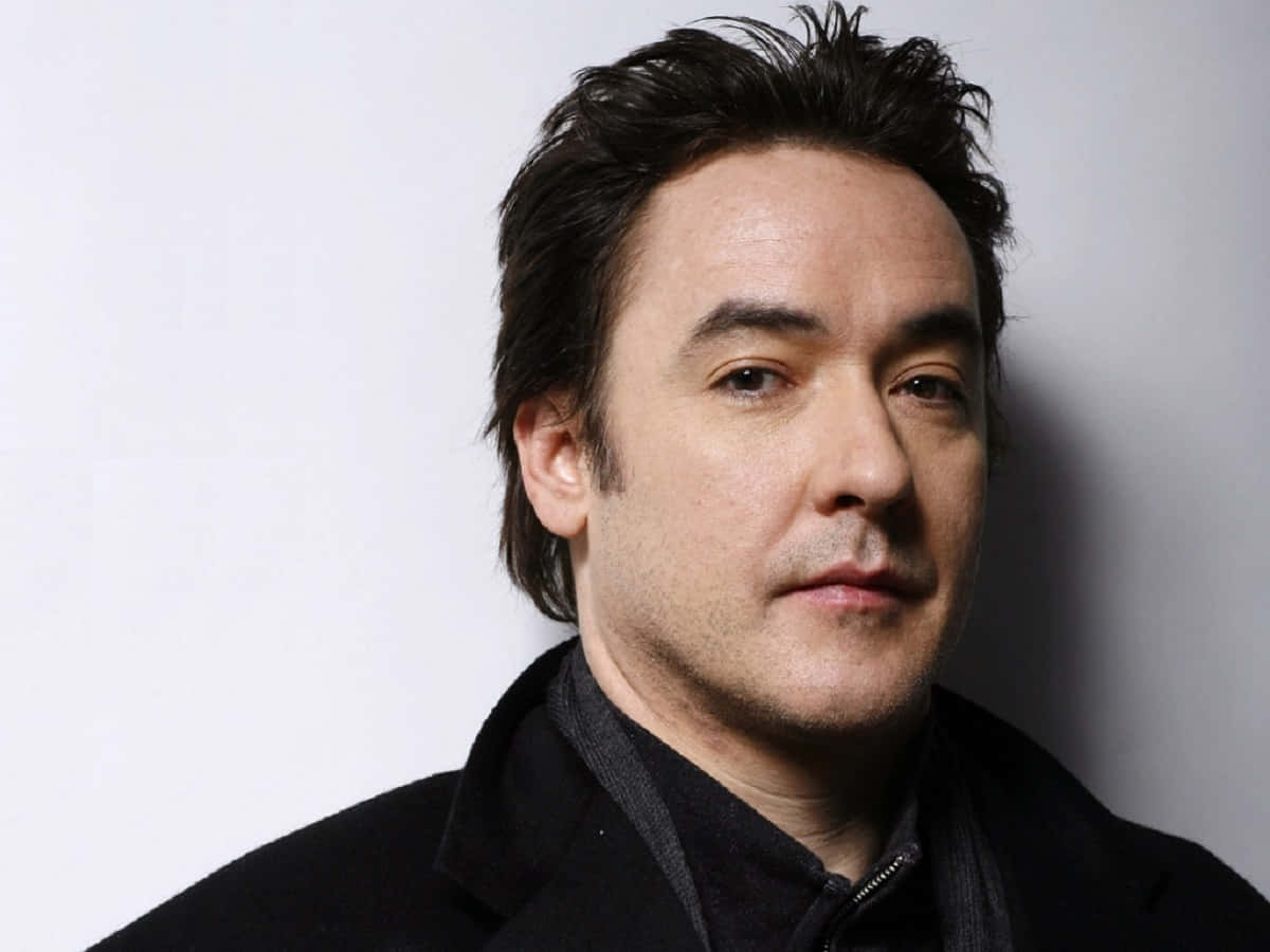 John Cusack - Charming And Engaging On Screen Background
