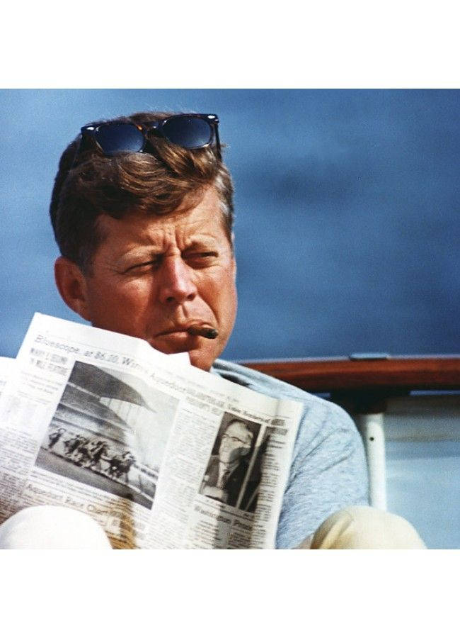 John F. Kennedy Reading Newspaper Background