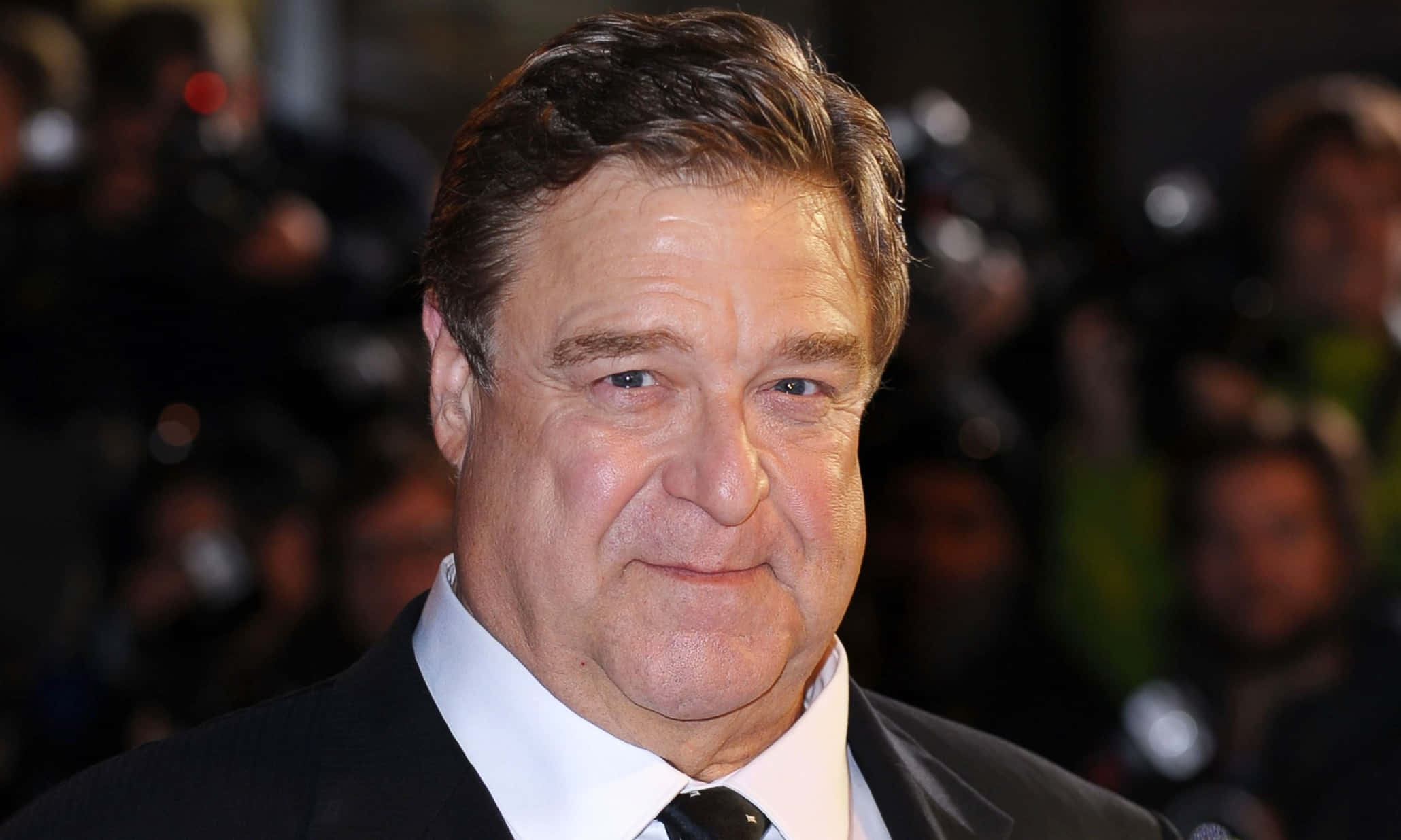 John Goodman In A Thoughtful Pose Background