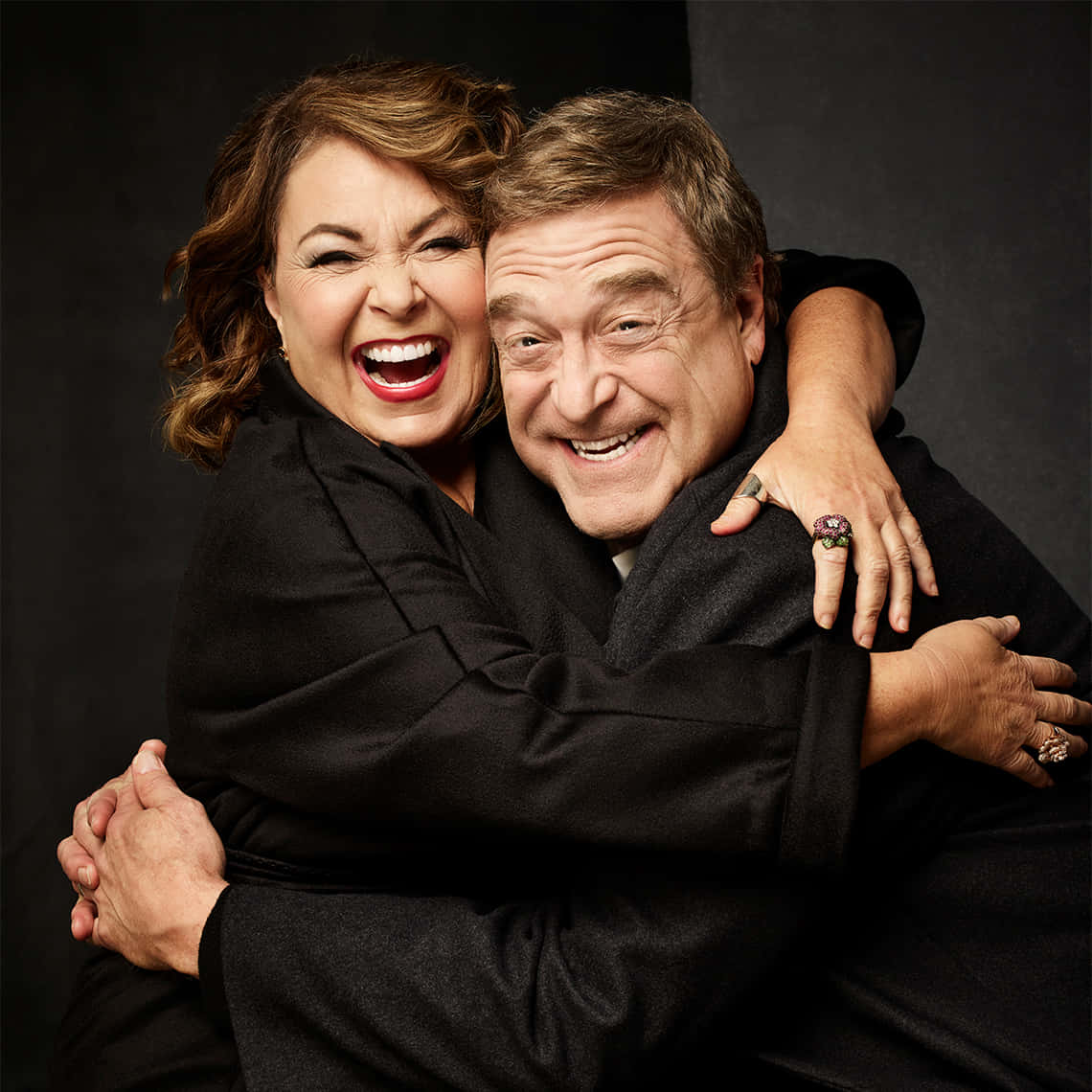 John Goodman Smiling In Photoshoot Background