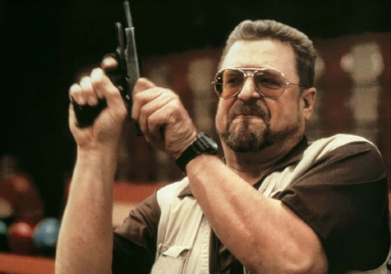 John Goodman Smiling In Suit Background