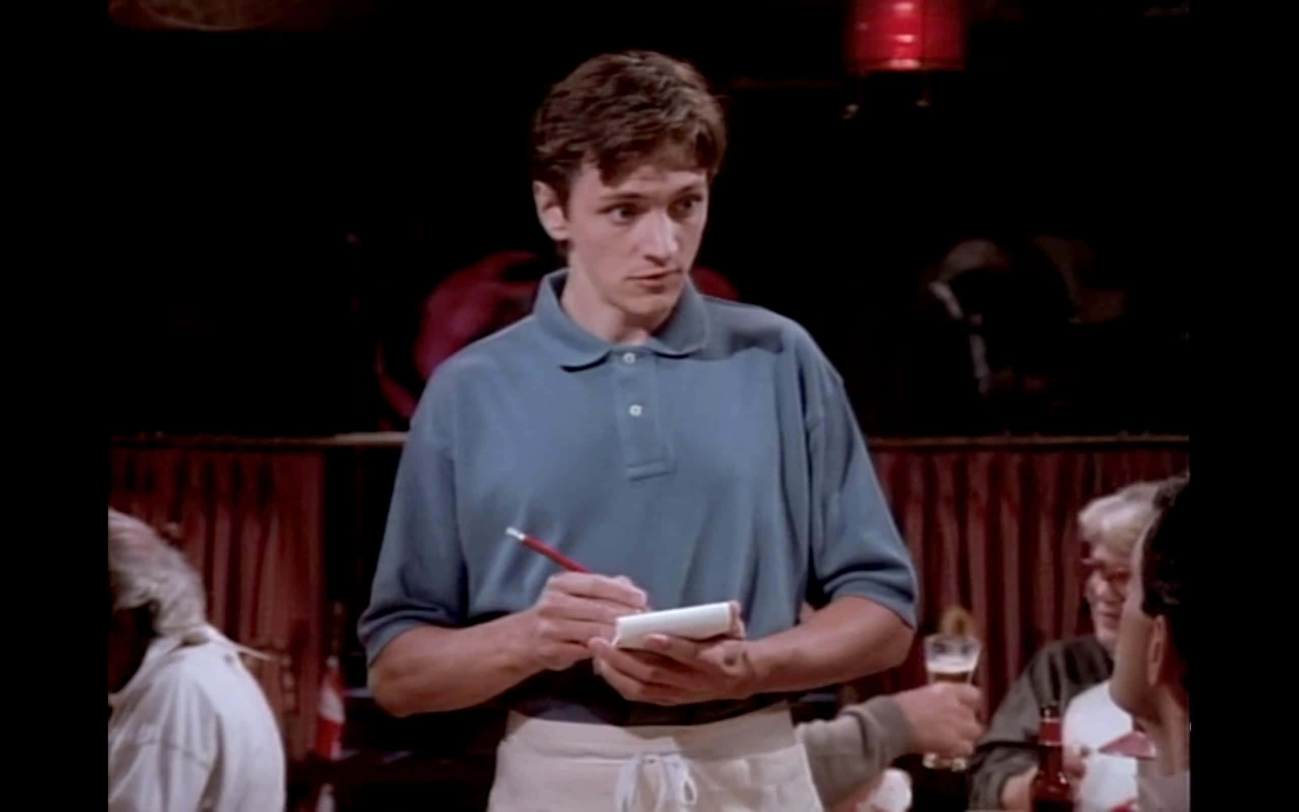 John Hawkes In A Pensive Pose Background