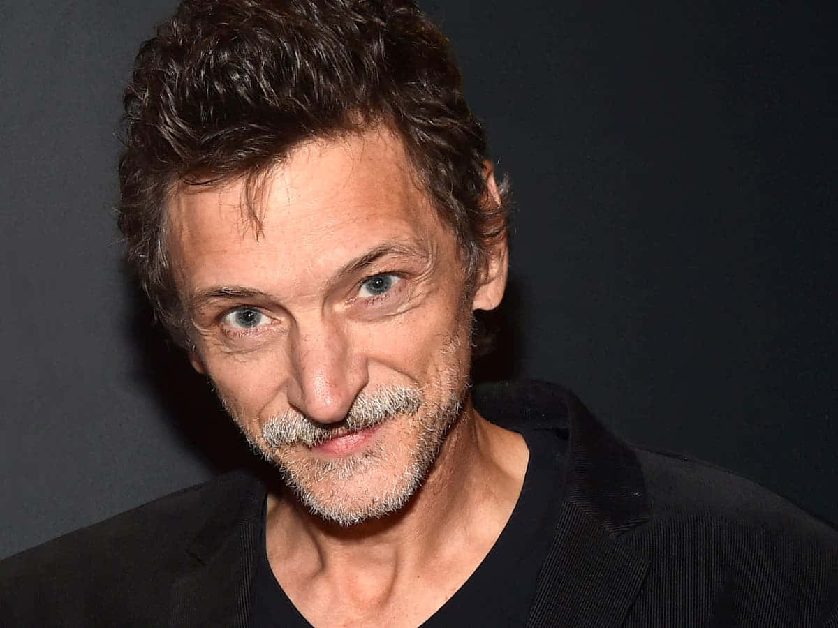 John Hawkes Posing At A Photo Shoot Background