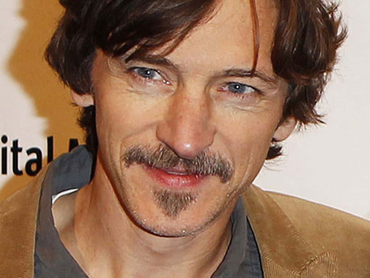 John Hawkes Posing For A Photoshoot