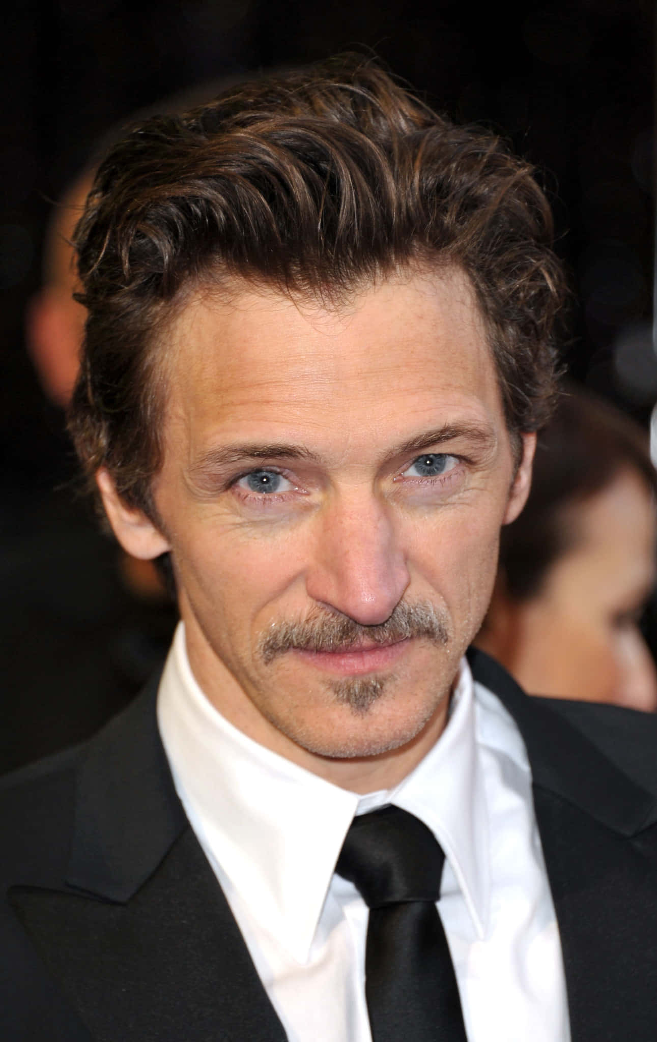 John Hawkes Posing For A Photoshoot Background