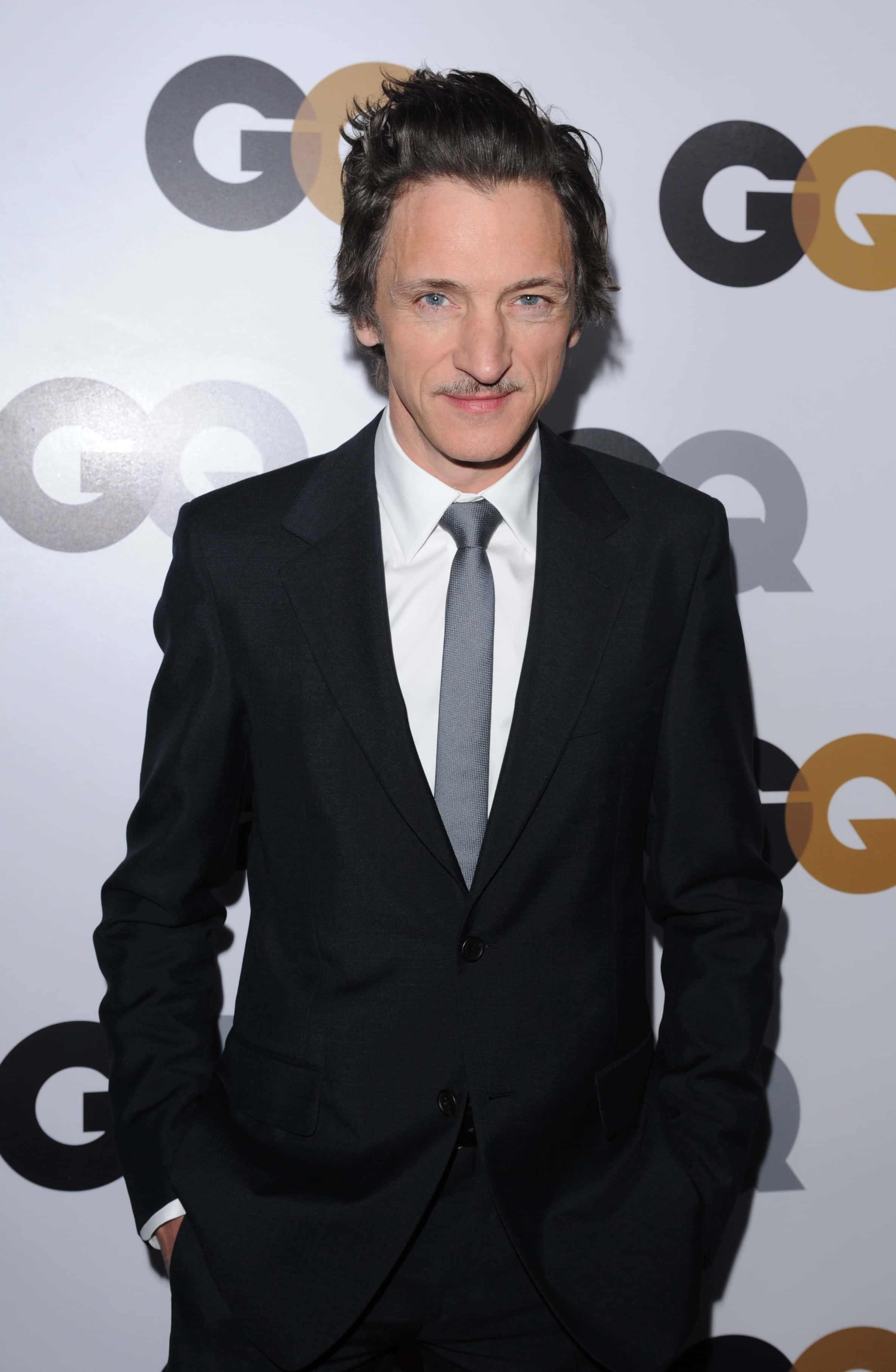 John Hawkes Posing For A Portrait Background