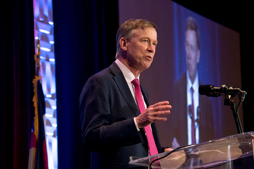 John Hickenlooper Delivering A Speech