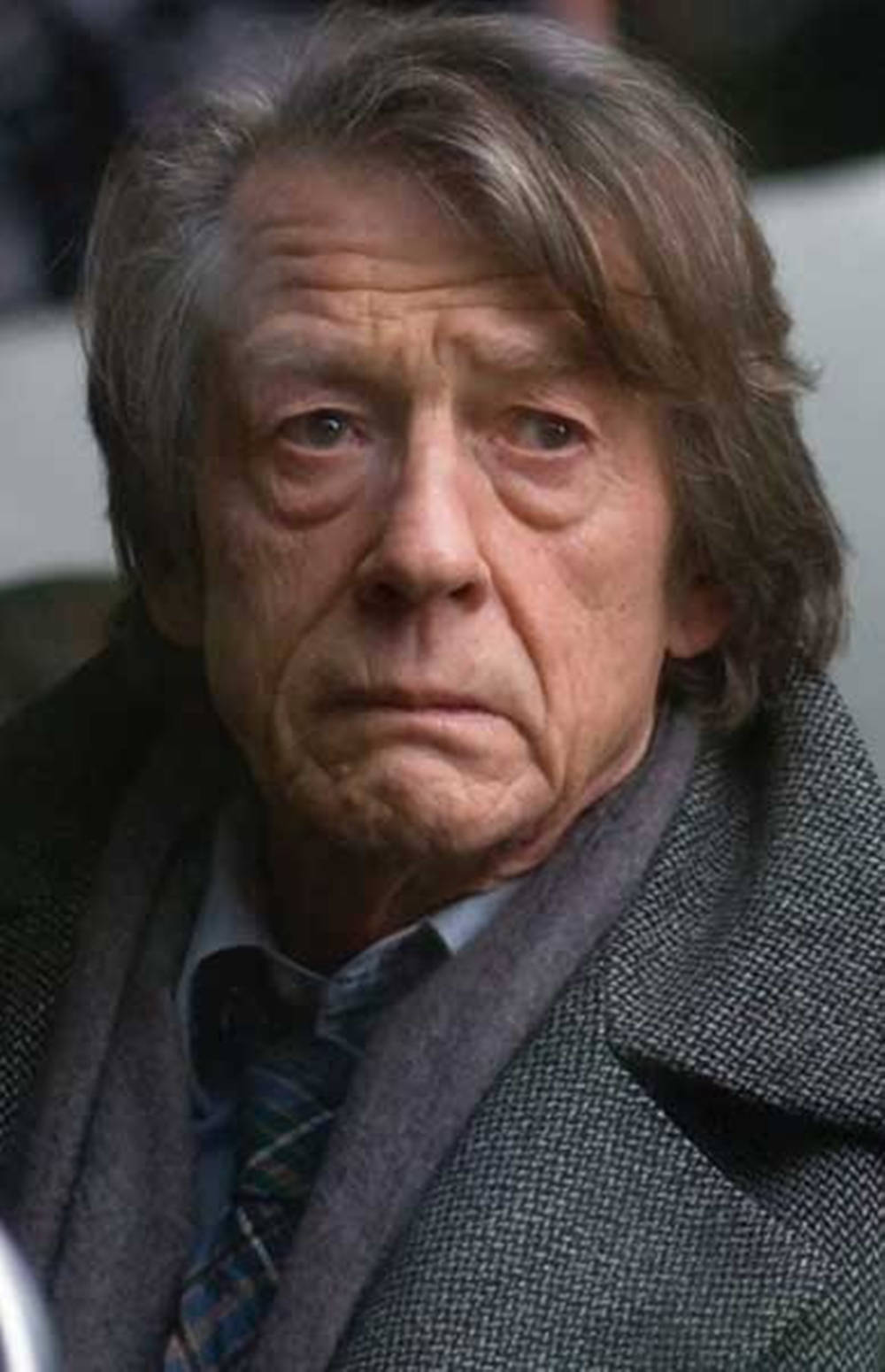 John Hurt Long Hair Sad Face Background