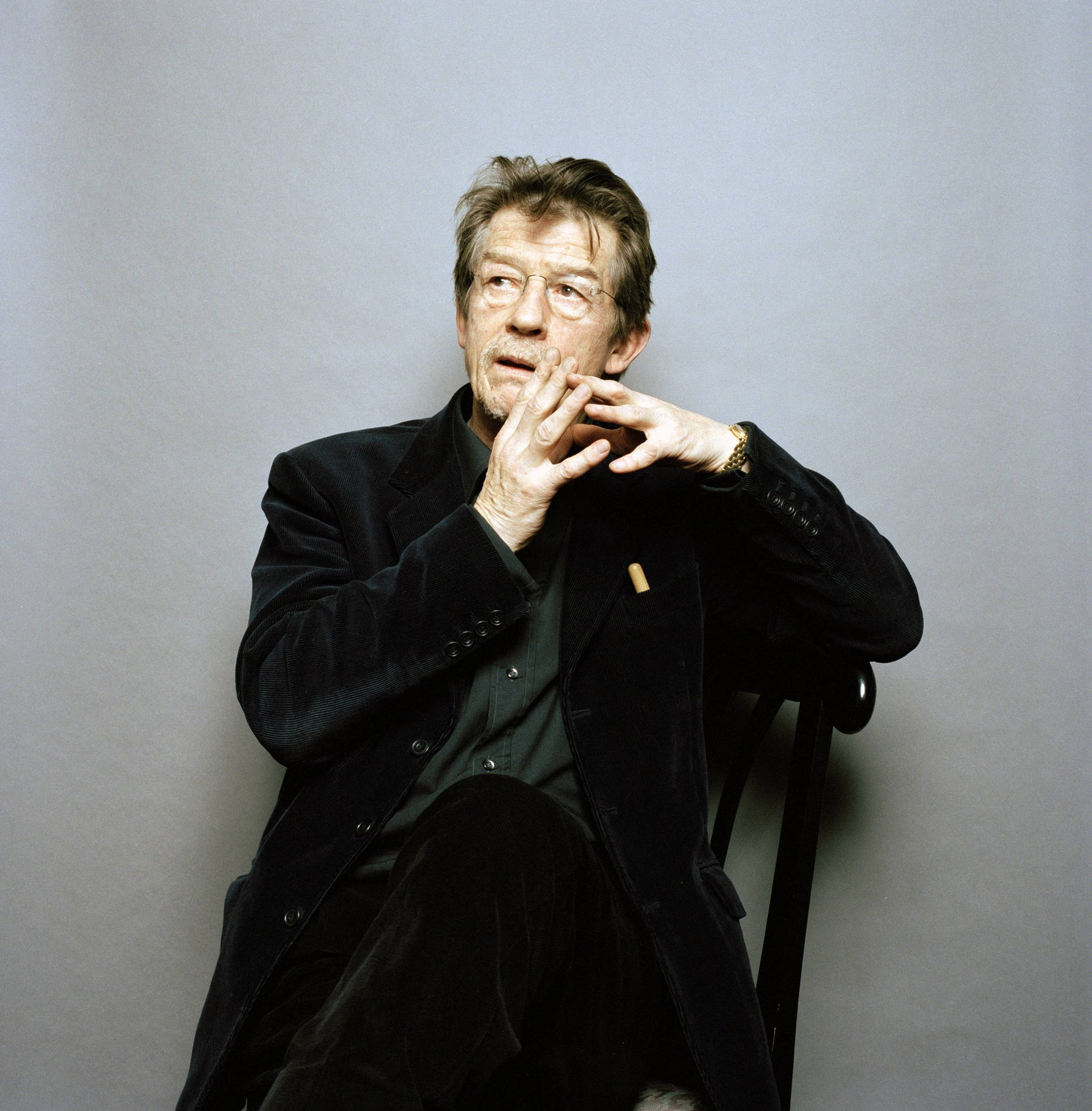 John Hurt On Gray Background