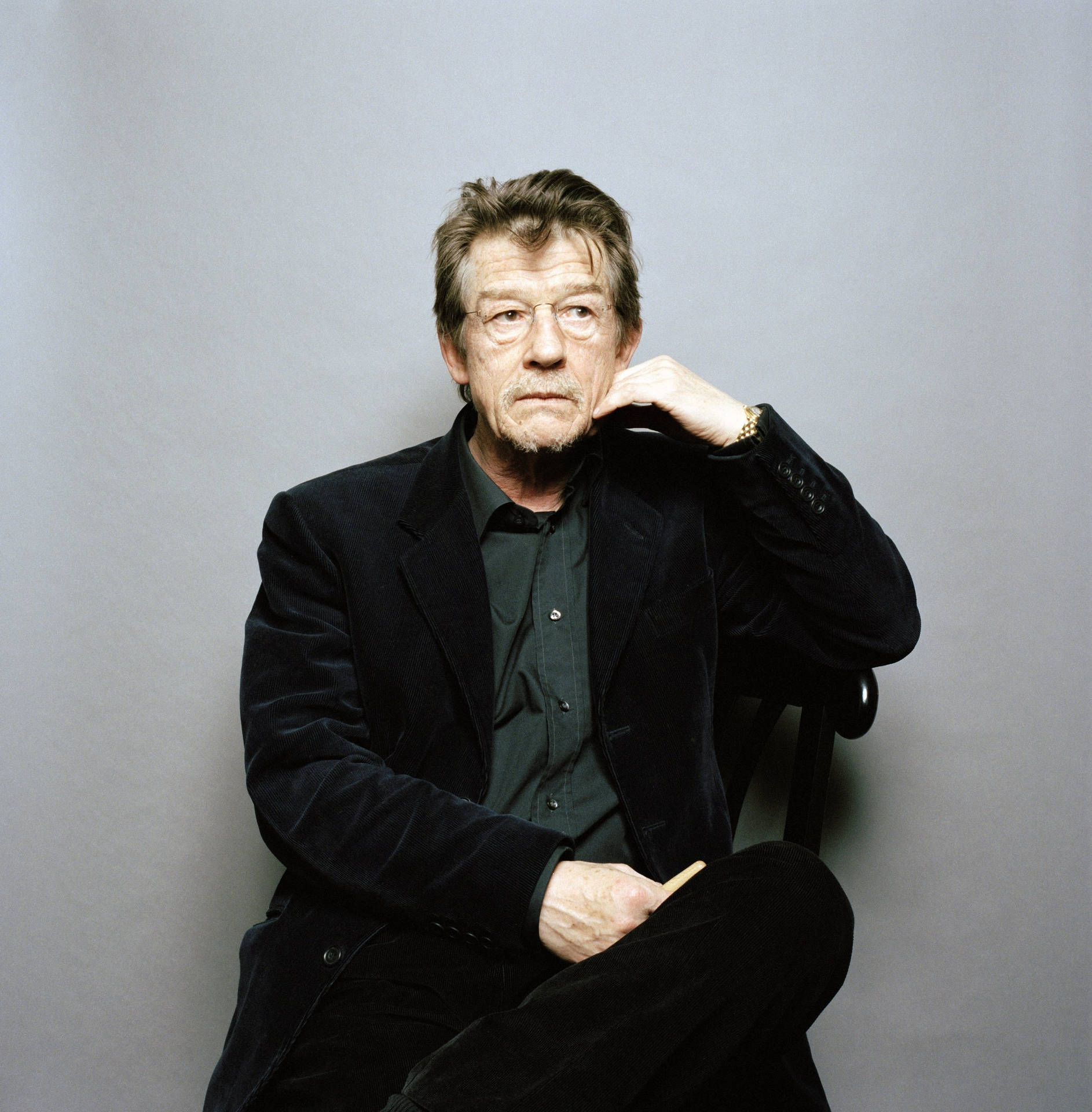 John Hurt Posing On Gray Background