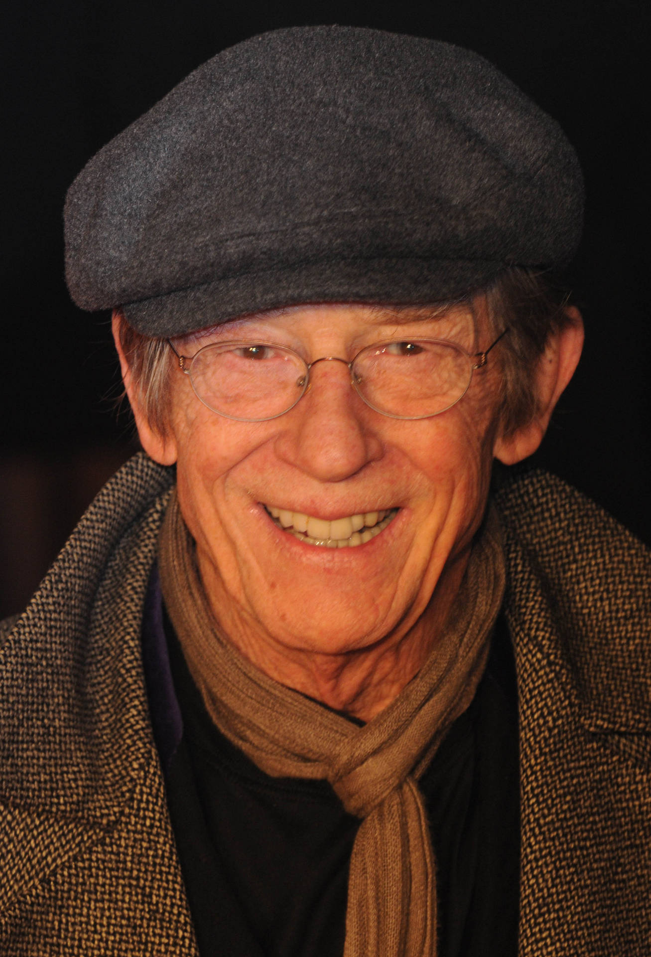 John Hurt With Hat And Glasses Background