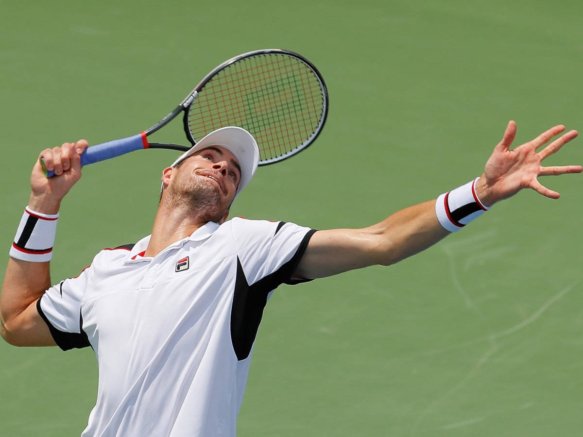 John Isner Swinging Racket Background