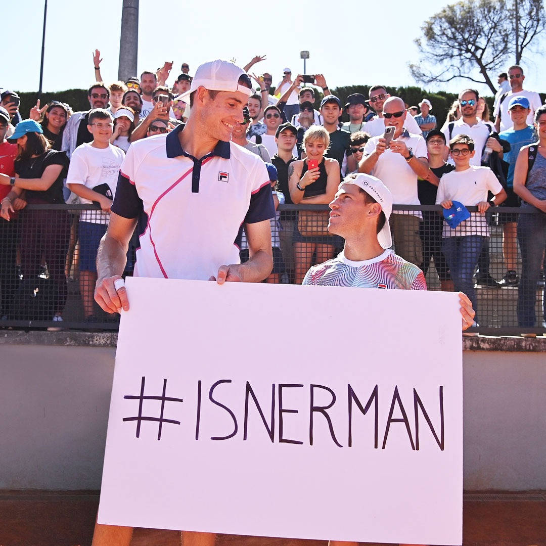 John Isner With Diego Schwartzman Background