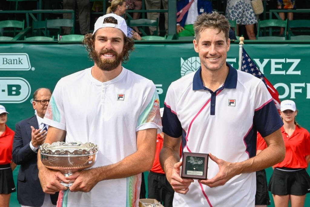 John Isner With Reilly Opelka Background