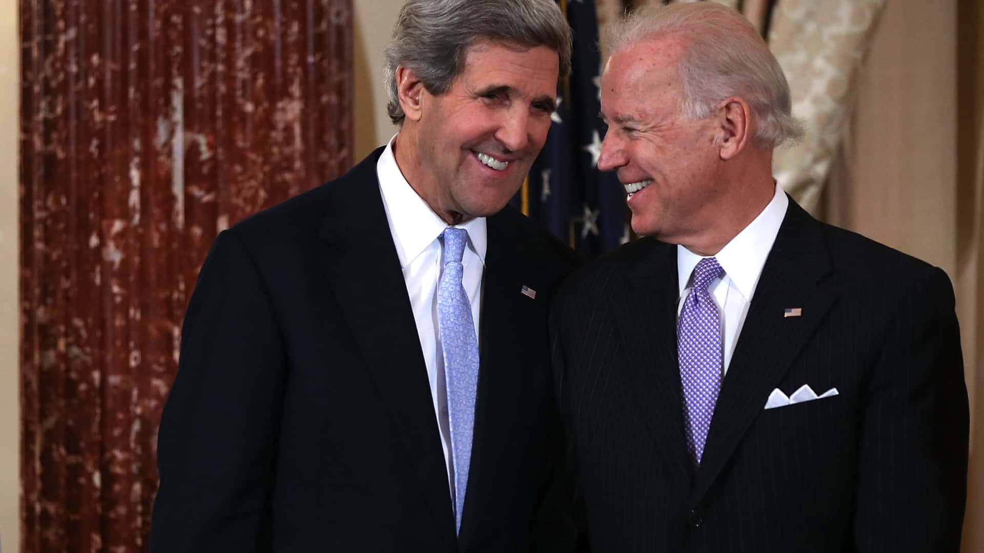 John Kerry And Joe Biden Smiling Background